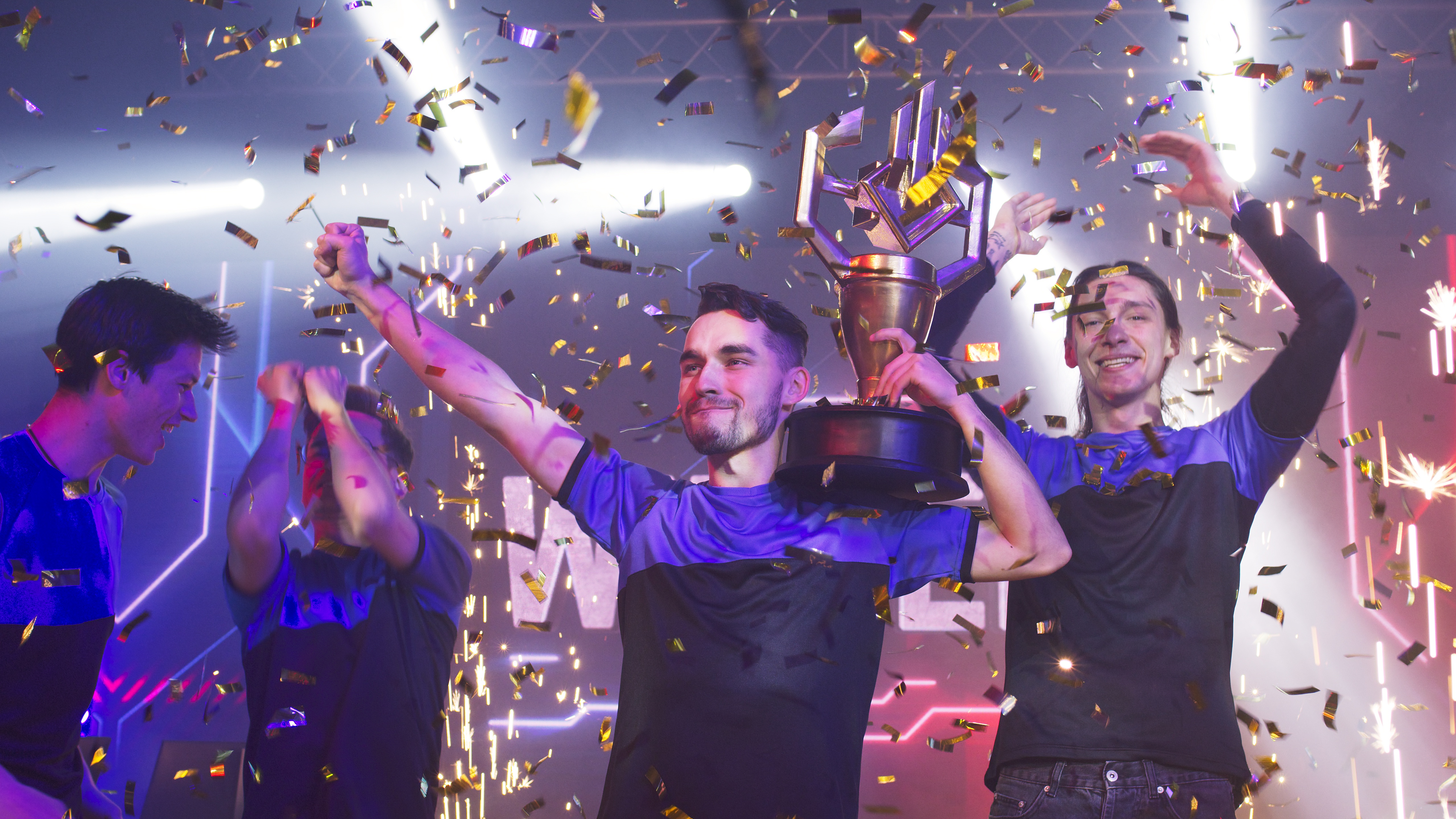 Players competing at a local esports tournament venue